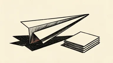 Northrop Grumman's price target is represented by a paper airplane resting on a stack of paper.